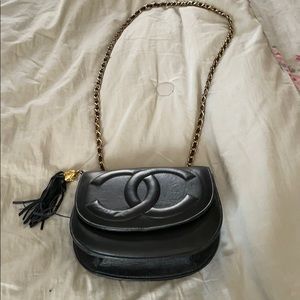 black shoulder purse with gold link strap